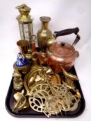 A tray containing an antique copper and brass kettle together with assorted brass ware to include