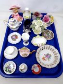 A tray containing assorted ceramics to include china flower posies,