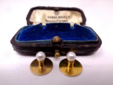 A pair of 15ct gold cultured pearl dress studs