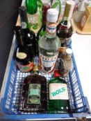 A crate of alcohol to include Ouzo, Country Mist Irish Cream,