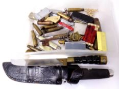 A box containing pen knives, Ronson and other lighters, two knives,