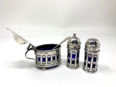 A silver three-piece cruet, Reid & Sons, London marks.