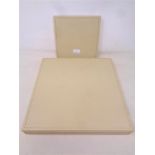 Two Rolex cream stitched leather watch display trays, 15 cm x 15 cm and 25 cm x 25 cm,