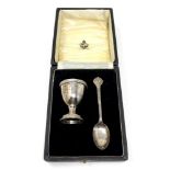 A Lindisfarne silver egg cup and spoon, Reid & Sons, Birmingham marks.