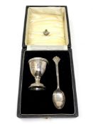 A Lindisfarne silver egg cup and spoon, Reid & Sons, Birmingham marks.