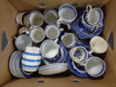 A box of willow pattern tea ware and ramekins by Churchill, Ringtons,