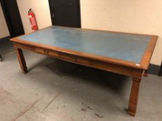 An early 20th century mahogany library table fitted with drawers.