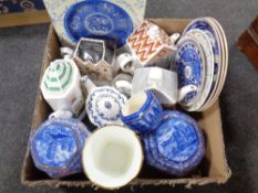 A box containing assorted Ringtons ceramics to include teapots, castles and cathedral caddies,