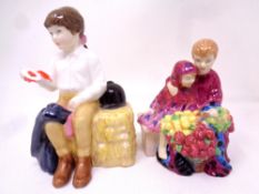 Two Royal Doulton figures - First Prize HN 3911 and Flowers Sellers Children HN 3807
