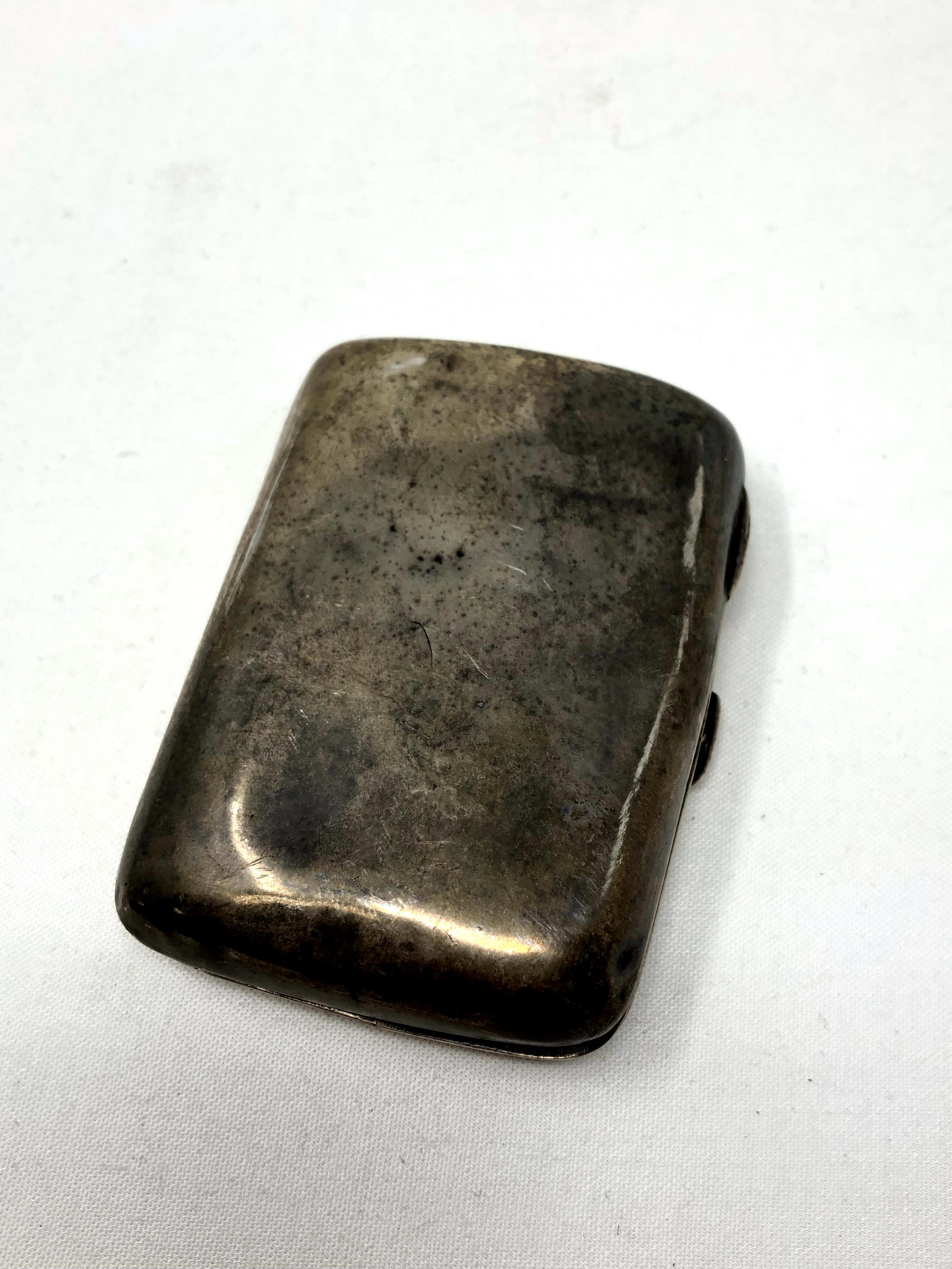 An antique silver combination sovereign and cigarette case CONDITION REPORT: 93g