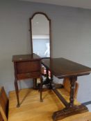 An oak sewing table on cabriole legs together with a refectory coffee table and mahogany framed