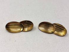 A pair of 9ct gold oval cuff links CONDITION REPORT: 5.