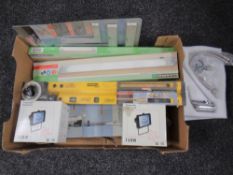 A box containing single lever sink mixer tap, halogen lights, drill stand,