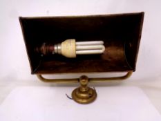 A vintage brass picture light.