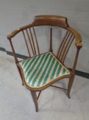 An Edwardian inlaid mahogany corner armchair