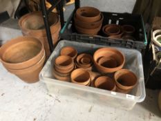 A large quantity of terracotta plant pots