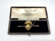 A 15ct gold and enamel Northumberland Fusiliers bar brooch CONDITION REPORT: 7g