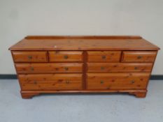 A Ducal pine eight drawer block chest