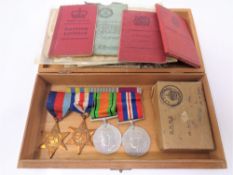 A group of four WWII service medals and ephemera relating to 1702289 DVR.