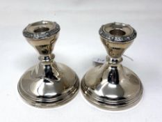 A pair of Lindisfarne silver dwarf candlesticks, Reid & Sons, Birmingham marks,