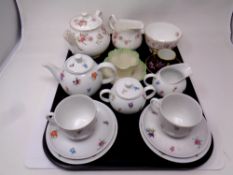 A tray containing assorted tea ware to include Duchess June Bouquet sugar basin,