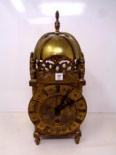 A brass lantern clock. Height 25.