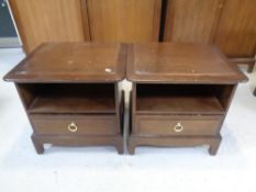 A pair of Stag Minstrel bedside tables fitted a drawer