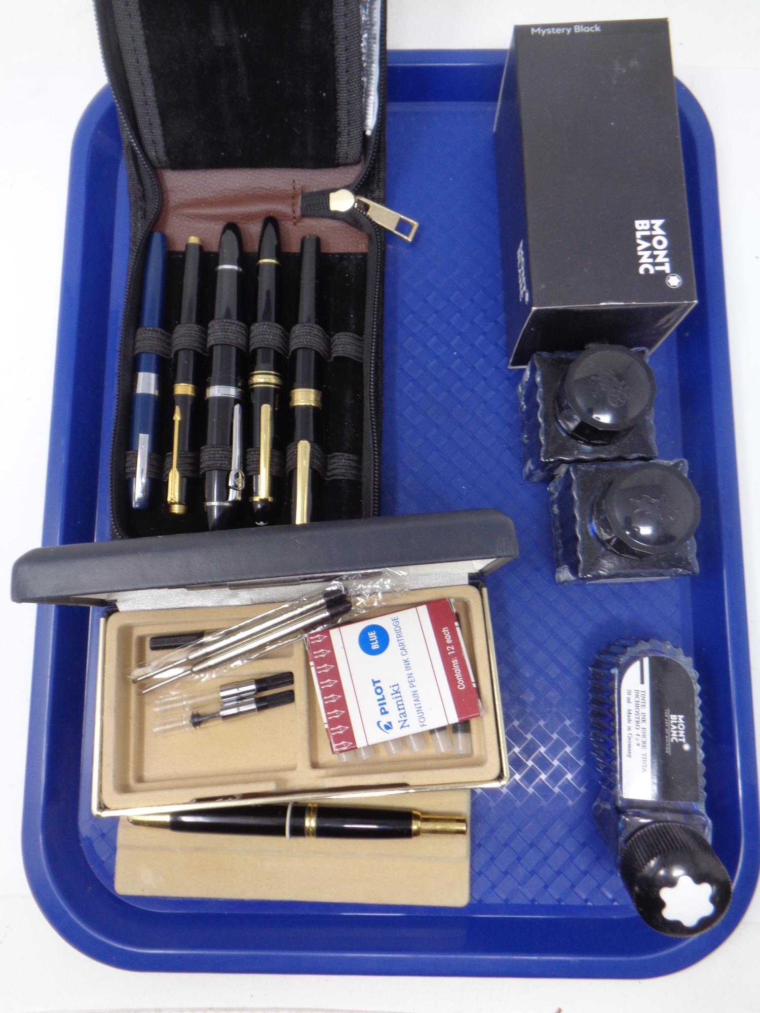 A tray containing assorted ball point and fountain pens to include Pilot, Parker, Mont Blanc,