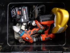 A crate of assorted power tools : Black & Decker drills, jigsaw, car tyre snow chains,