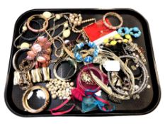 A collection of costume jewellery, bangles etc.