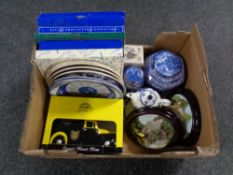 A box containing a quantity of boxed and unboxed Ringtons ceramics to include wall plaques, caddies,