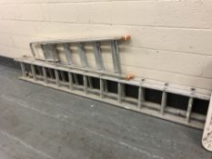 An aluminium extension ladder together with a set of steps