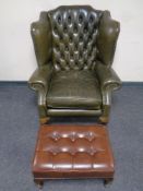 A Chesterfield wingback armchair upholstered in green leather together with a further Sherborne