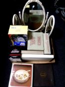 A cream and gilt triple dressing table mirror together with a box containing assorted plated and