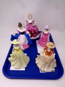 A tray containing Coalport Ladies of Fashion figure, Rosemary,