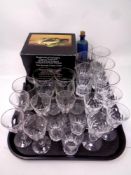 A tray containing antique and later glassware to include blue glass chemists bottle,