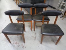 A set of four mid 20th century teak Schreiber dining chairs