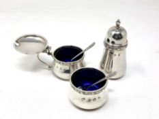 A Lindisfarne silver three-piece cruet, Reid & Sons, Birmingham marks.