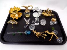A tray containing a quantity of assorted brass and lead crystal ornaments to include Swarovski