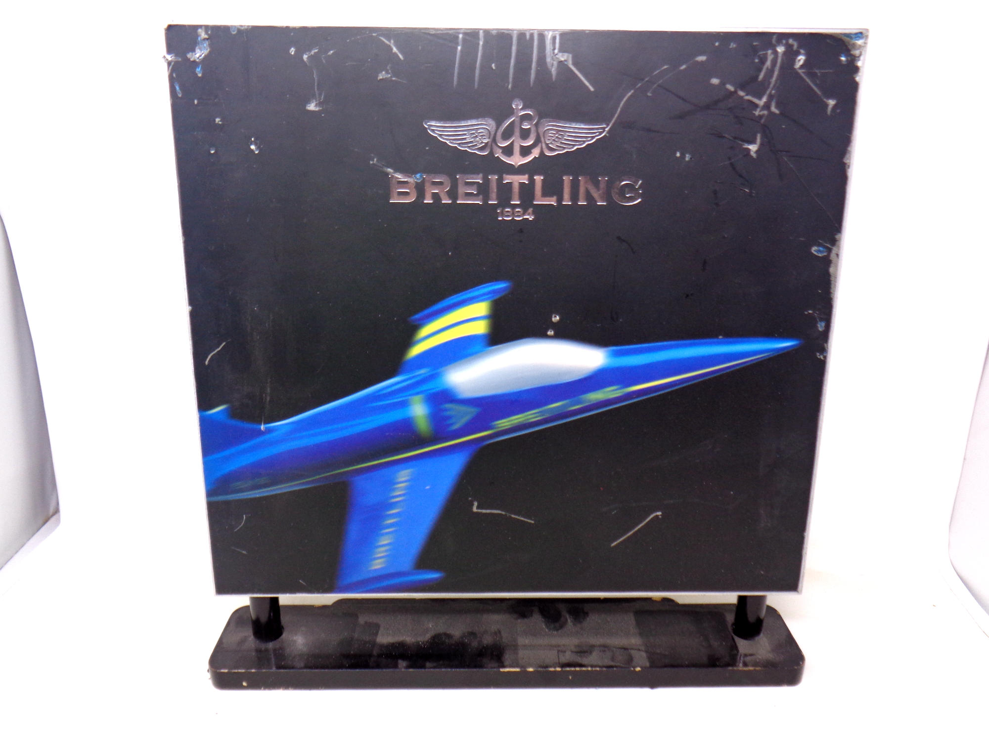 A Breitling twin sided shop advertising stand, one side with relief fighter jets. Height 39. - Image 2 of 2