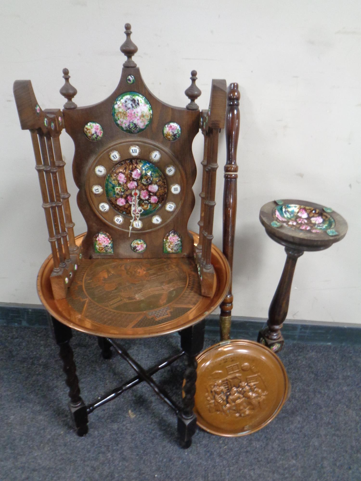 A copper topped folding table on barley twist stand,