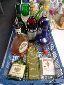 A crate of alcohol to include Campari, Beefeater Dry Gin, Goldkenn Swiss chocolate liqueur,