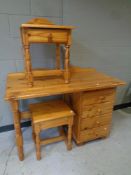 A pine single pedestal dressing table fitted four drawers with stool together with a further pine