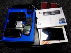A tray containing assorted mobile phones to include Nokia, Sony Ericson,