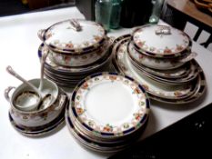 Thirty-eight pieces of 19th century dinner ware to include tureens with ladles