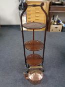 A 19th century copper kettle together with an inlaid mahogany three-tier folding cake stand