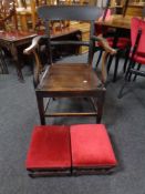 A 19th century armchair together a pair of foot stools