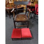 A 19th century armchair together a pair of foot stools