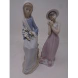A Lladro figure, seated lady with lilies together with a further Lladro figure, Girl with flower.