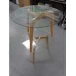 A pair of contemporary glass topped lamp tables